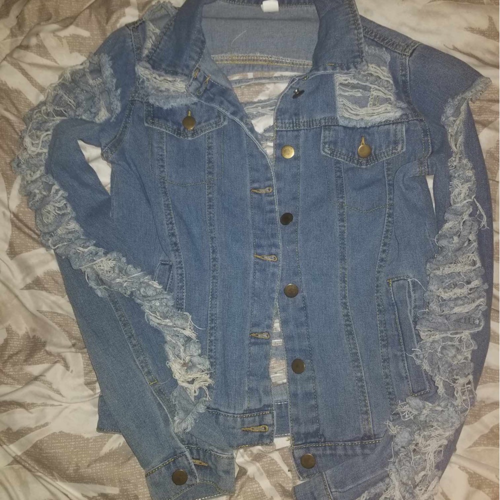 Distressed denim jacket